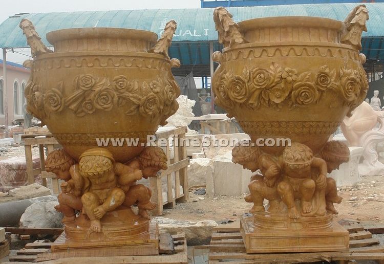 Stone pot with carved 